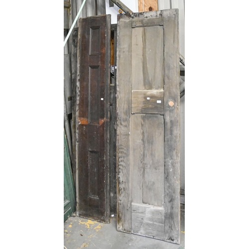 1392 - A Victorian pine panelled door,  another and two lengths of stained wood panelling, various sizes, 6... 