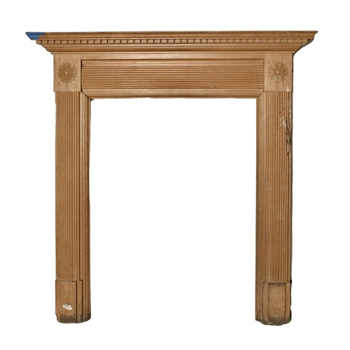 1402 - A  neoclassical style chimneypiece, with carved flower paterae, 105cm h, 101cm l (60 x 81 inner)... 