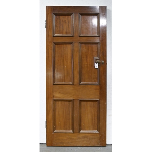 1403 - An Edwardian  mahogany  six panel door with contemporary brass mortice lock, oval knobs and escutche... 