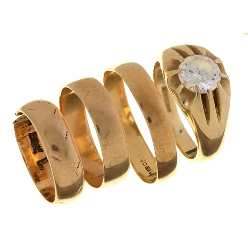 143 - Three 9ct gold wedding rings and a white stone gentleman's ring in 9ct gold, 16.5g, various sizes... 