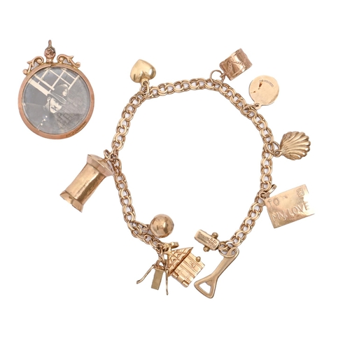 151 - A gold charm bracelet, 18.5cm l, 11.2g and a 9ct gold photo locket (2)