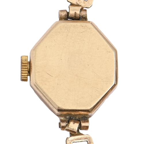 179 - A Helvetia 9ct gold octagonal lady's wristwatch, 15 x 17mm, Birmingham 1965, on plated bracelet... 