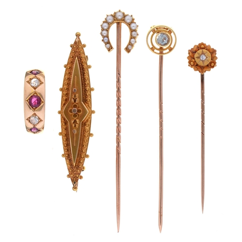 199 - A Victorian diamond stickpin, gypsy set in gold, two other stickpins, a 15ct gold shuttle shaped bro... 