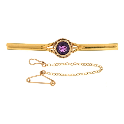 200 - An amethyst bar brooch, in 22ct gold, 57mm l, Birmingham 1932, 5.3g