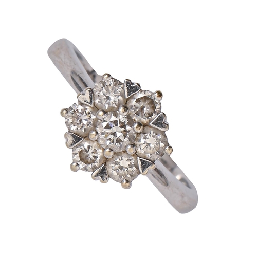 203 - A diamond cluster ring, in 18ct white gold, Convention marked and marked PIA 075, 3.8g, size I... 