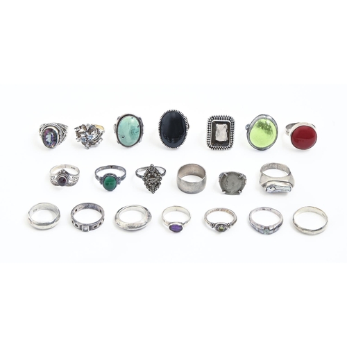 218 - Twenty silver rings, mostly, and variously, gem set, in a leather jewel box