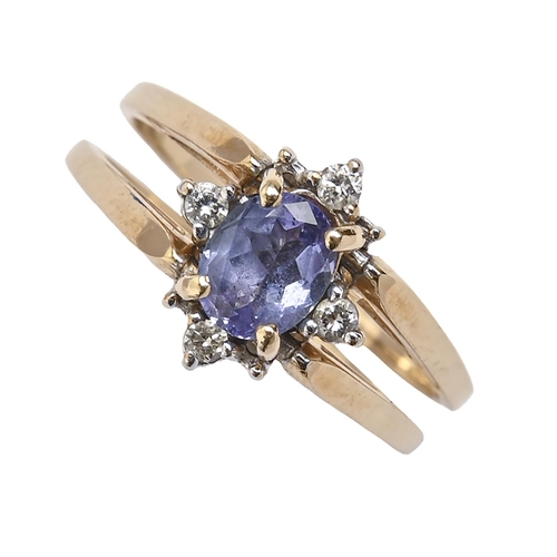 231 - A tanzanite and diamond ring, in gold marked 14k 585, 4.6g, size O