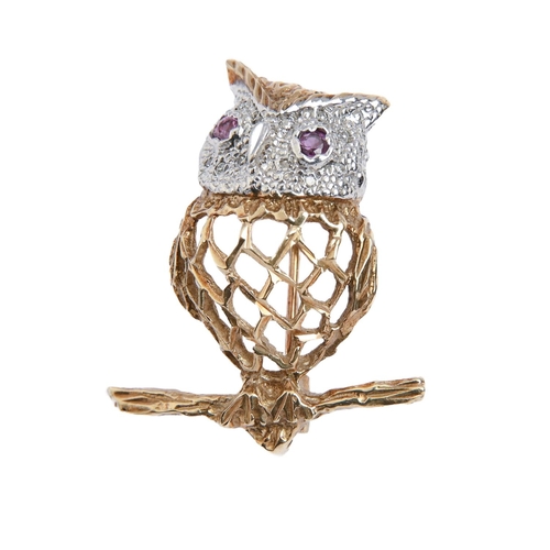 251 - A ruby and diamond openwork owl brooch, in two colour 9ct gold, 30mm, 4.9g