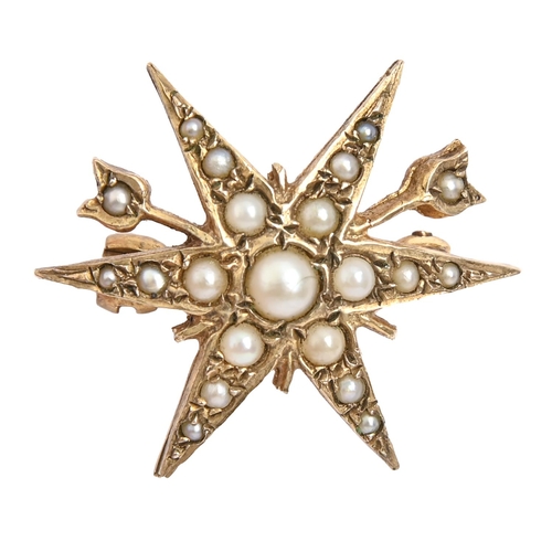 256 - A Victorian split pearl star brooch, in gold, 24mm, 3.3g