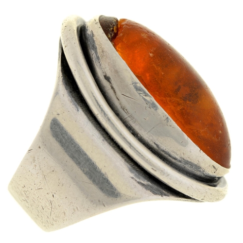 27 - A Danish amber ring, in silver marked 925 COF STERLING, maker's mark obscured, Denmark, 12.6g, size ... 