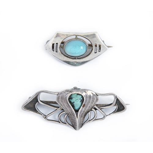 283 - Two Arts & Crafts silver brooches, c1910, one set with turquoise glass, the other with turquoise... 