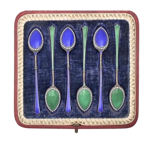 320 - A set of six silver gilt and enamel coffee spoons, import marked, W F Bateman, London 1898, cased, 1... 