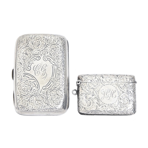 390 - An Edwardian silver cigarette case, 82mm l, by W M Hayes, Birmingham 1902 and a silver vesta case, 3... 