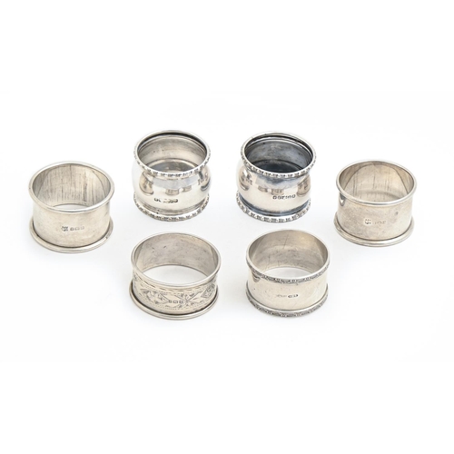 478 - Two and a pair of George V silver napkin rings, various makers, 2ozs and a pair of EPNS examples (6)... 