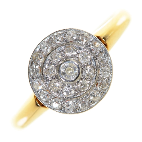 61 - A diamond cluster ring, early 20th c, head 10mm diam, gold hoop marked 18ct, size O, 3.2g... 