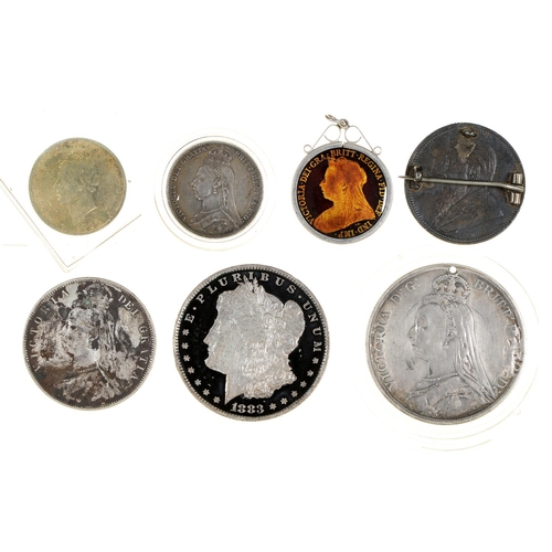 616 - Seven United Kingdom and foreign enamelled silver coins, including a Victorian crown 1888, two mount... 