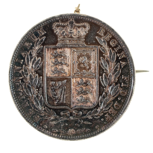 617 - A Victorian silver halfcrown mounted as a brooch