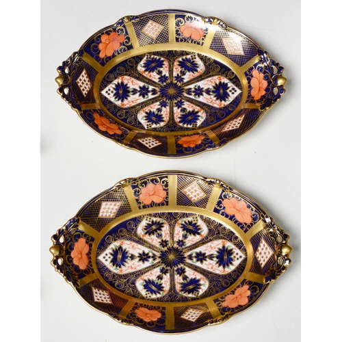 689 - A pair of Royal Crown Derby Imari pattern fruit dishes, third quarter 20th c, with pierced acorn han... 