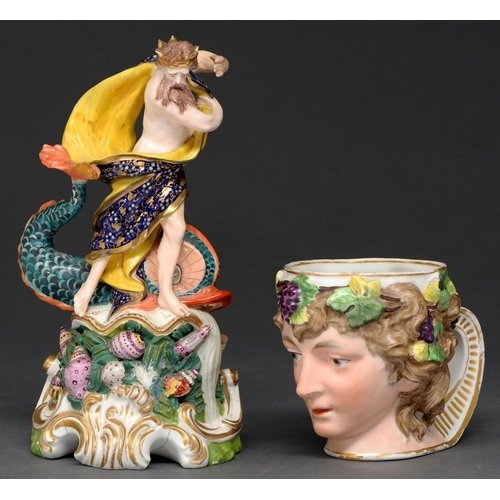 695 - A Derby Bacchus mug, c1800,  with gilt handle, 93mm h and Derby figure of Neptune with a dolphin, c1... 