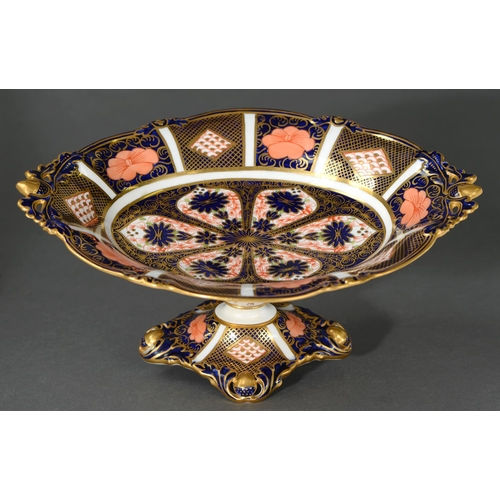 696 - A Royal Crown Derby Imari pattern fruit stand, 1940, with pierced acorn handles and feet, 27cm l, pr... 