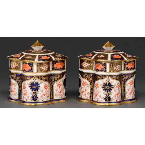 700 - A pair of Royal Crown Derby Imari pattern boxes and covers, 1928 and 1929, 10.5cm h, printed mark... 