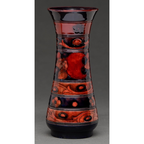 705 - A Moorcroft flambe Pomegranate vase, c1930, 18cm h, impressed mark, painted initials... 