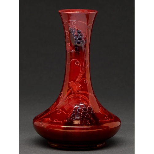 706 - A Moorcroft ruby lustre Grapes vase, c1910, 14.5cm h, painted signature