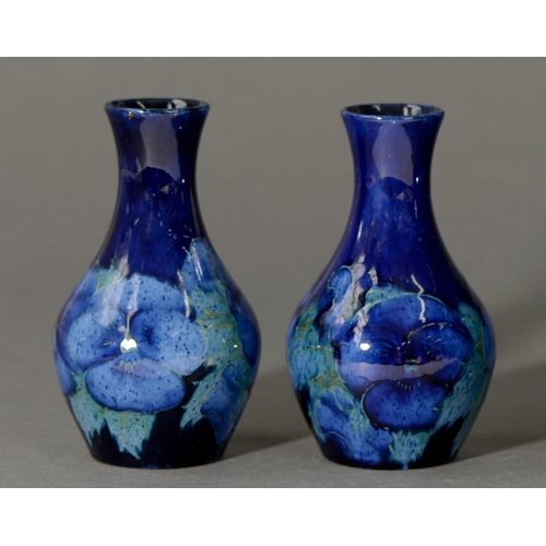 707 - A pair of Moorcroft Blue Poppy vases, c1920, 13.5cm h, impressed marks, painted initials... 