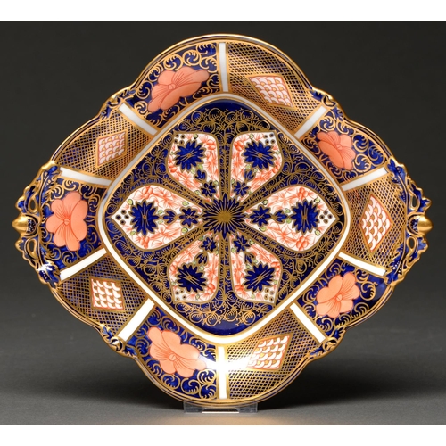 709 - A Royal Crown Derby Imari pattern dish, 1940, with pierced acorn handles and feet, 23cm l, printed m... 