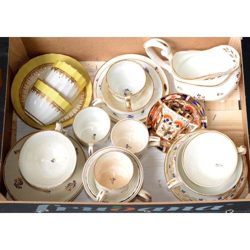 717 - A study collection of Derby teaware, c1790 – early 19th c, to include a fluted yellow bordered trio ... 