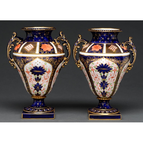 720 - A pair of Royal Crown Derby pear shaped Imari pattern vases, 1938 and 1939, 24cm h, printed mark... 