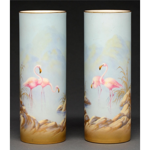 722 - A pair of Royal Worcester cylindrical vases, 1921, painted by G Johnson, both signed, with flamingos... 