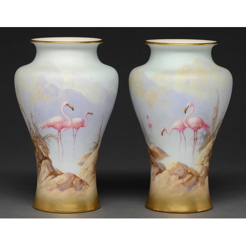 723 - A pair of Royal Worcester vases, 1912 and 1914, painted by W Powell, both signed, with flamingos in ... 