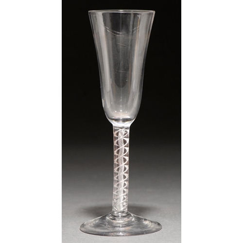 734 - A wine glass, mid 18th c,  the bell bowl on multiple spiral air twist stem and conical foot, 16.5cm... 