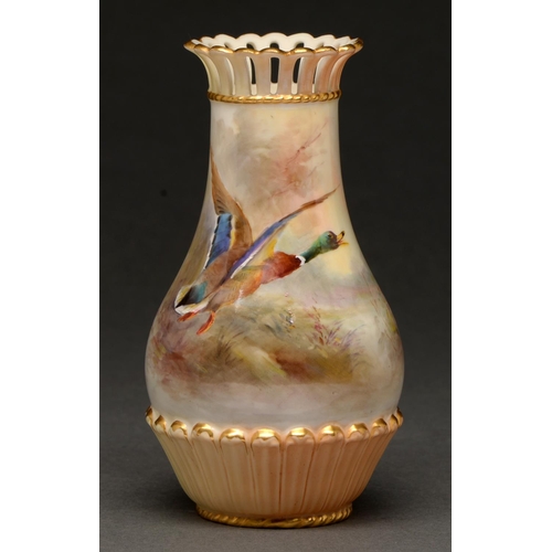 750 - A Royal Worcester vase, 1908, with pierced neck, painted by Jas Stinton, signed, with flighting mall... 