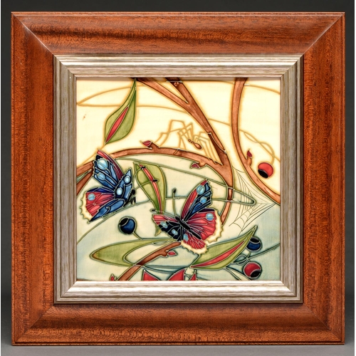 755 - A Moorcroft plaque, 2002, of butterflies, 19.5 x 19.5cm, impressed and painted marks, framed... 