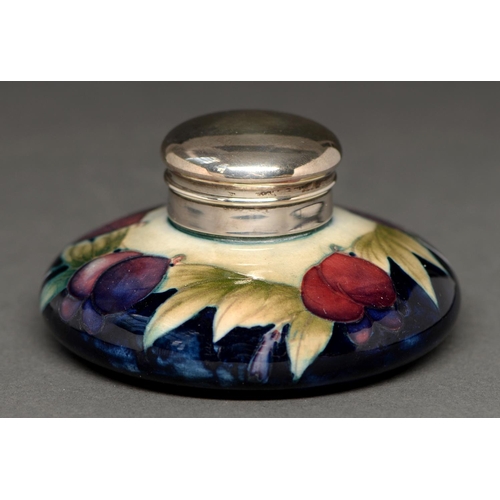 757 - A Moorcroft Wisteria inkwell, c1930, mounted with later silver lid, 11cm diam, impressed mark... 