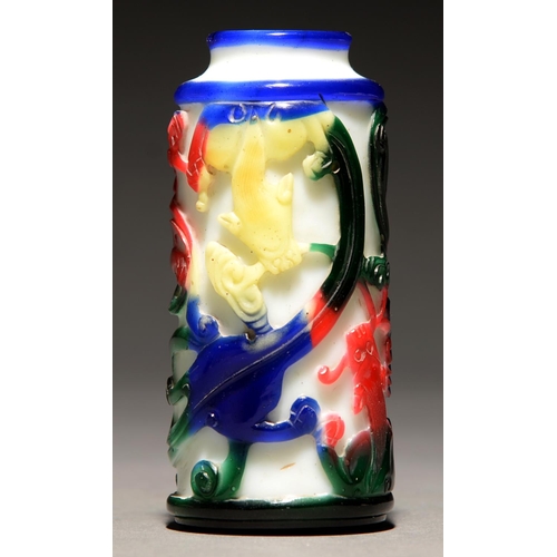 761 - A Chinese four colour cameo glass vase, 20th c,  overlaid on white glass and carved with mythical cr... 