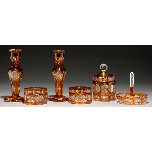 766 - An amber flashed cut glass dressing table set, early 20th c, candlesticks 16.7cm h (9)... 