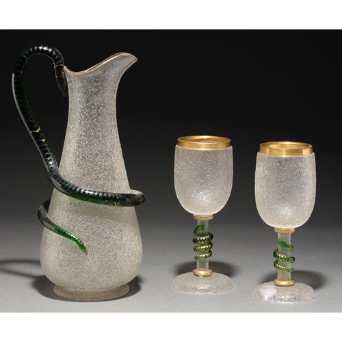 767 - A Victorian green, gilt and crizzled glass jug and a pair of goblets,  with serpent handle or entwin... 