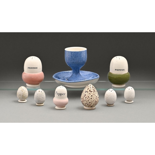 792 - Eight James Macintyre & Co acorn and bird's egg shaped luncheon and other salt and pepper pots, ... 