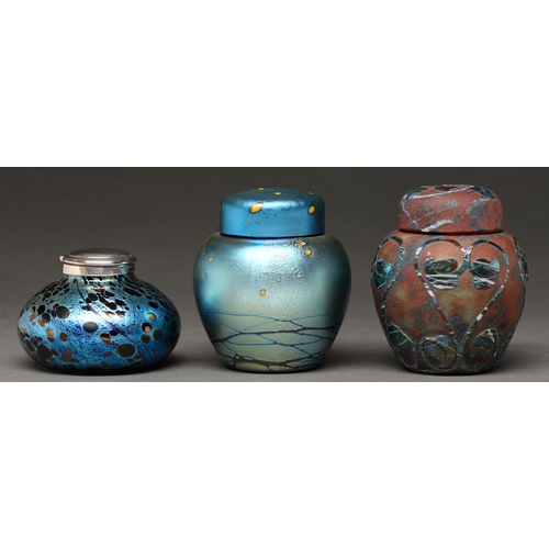 815 - Two Okra iridescent glass ginger jars and covers, c2000, 10cm h, etched and engraved marks and numbe... 