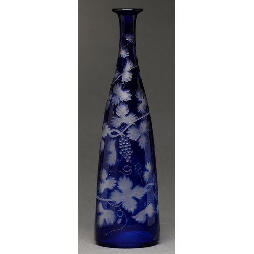 817 - A blue cased glass decanter, mid 19th c,  wheel engraved with spiralling vines with bunches of grape... 