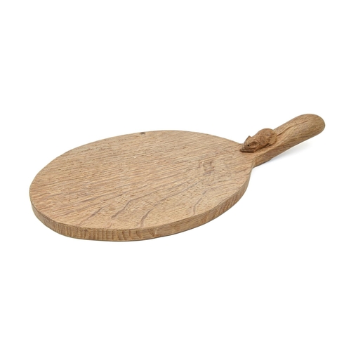 902 - A Robert 'Mouseman' Thompson oak cheeseboard, the handle with carved mouse 'signature', 36.5cm l... 