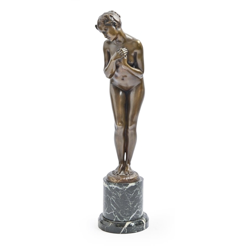 927 - An Art Deco bronze statuette of a young woman, c1930, cast from a model by A Saladin, even gold and ... 