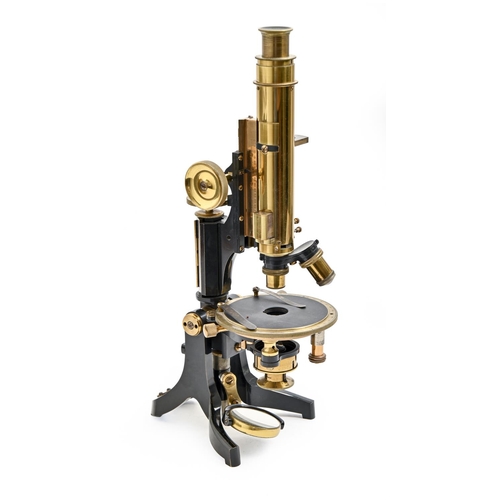 943 - A compound monocular petrological microscope, J Swift & Son, with rack and pinion and calibrated... 