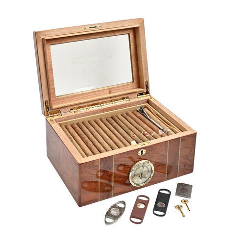 945 - Cigar smoking. A walnut and inlaid humidor, late 20th c, 34cm l