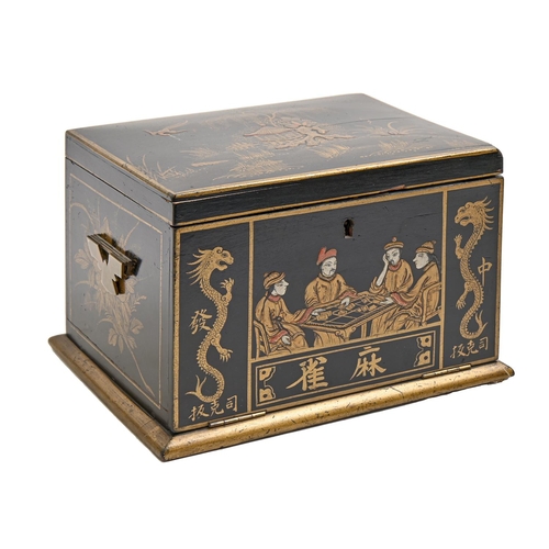 960 - A mahjong set in japanned cabinet, c1930, of bone and bamboo tiles and sticks, cabinet with hinged b... 