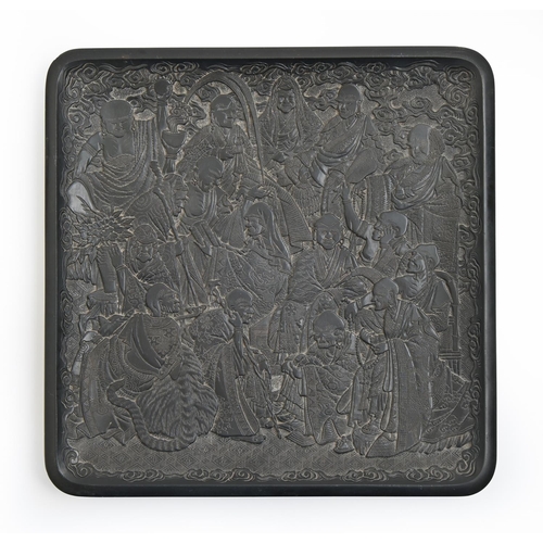 965 - A Chinese carved slate tray, 20th c, with immortals, the underside with phoenix, flowers and scroll,... 