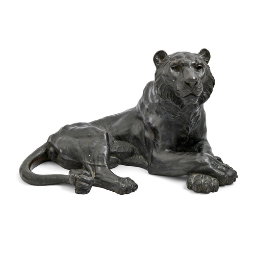 970 - A Japanese bronze  sculpture of a tiger, early 20th c           uneven dark patina slightly speckled... 